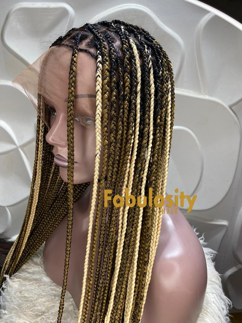box braids with brown highlights